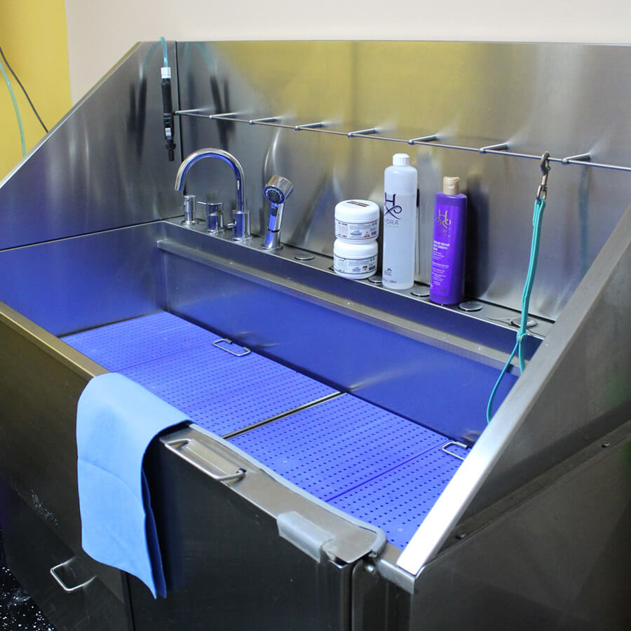 industrial grooming bath tub with products